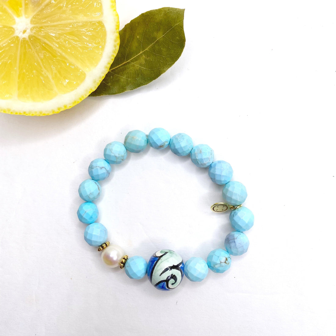 Light Turquoise Magnesite with Handpainted Ceramic Pallina